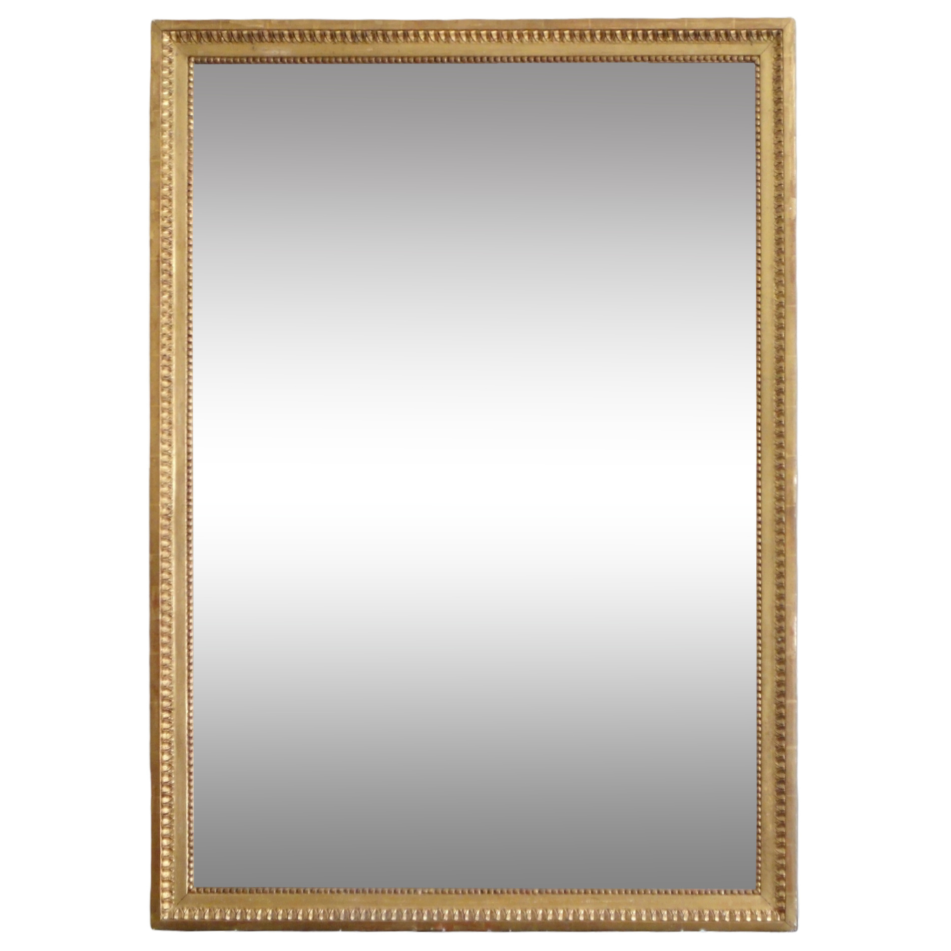 Grand miroir de cheminée Louis XVI doré à la feuille d'or, glace au mercure - 145cm x 107cm