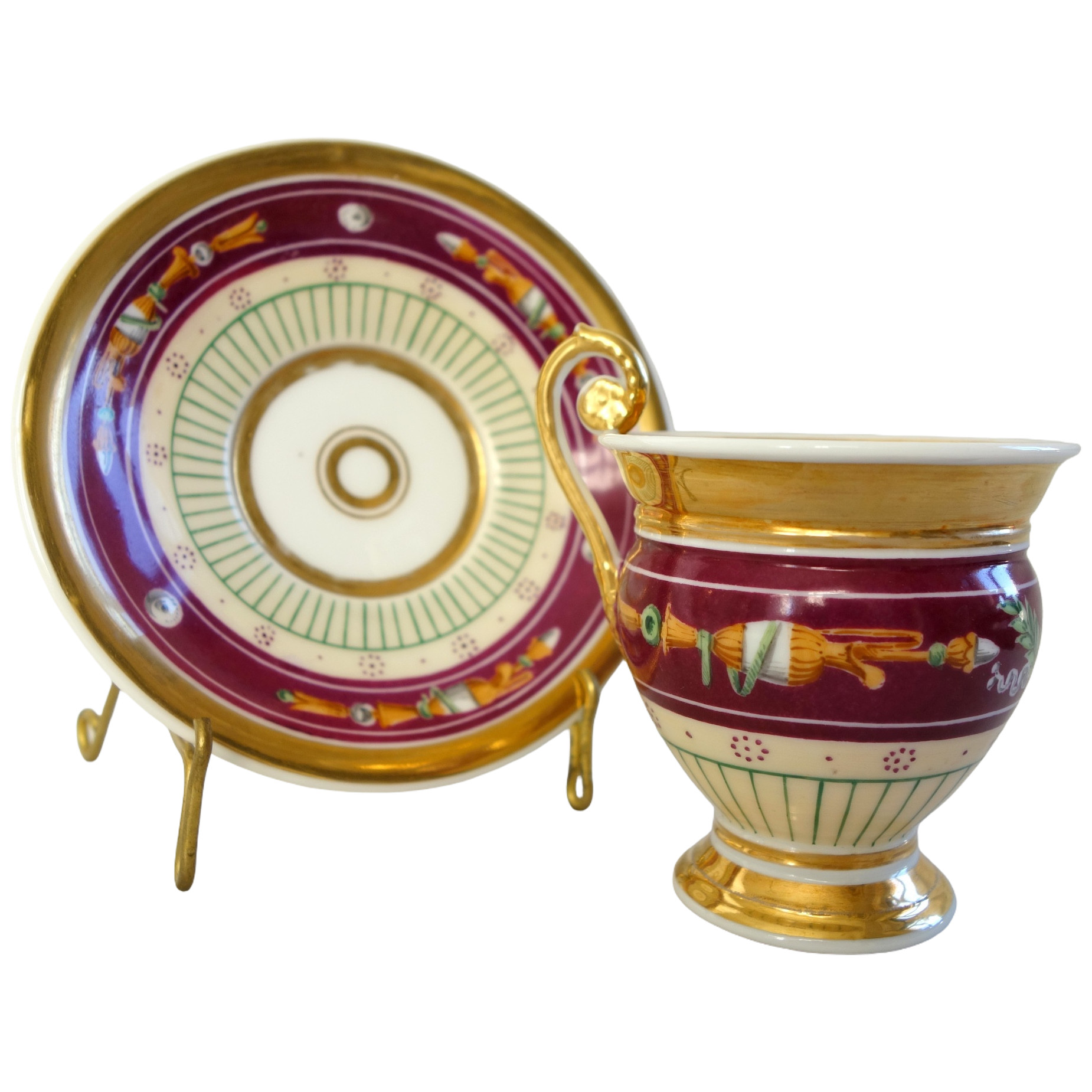 Empire Paris porcelain coffee cup enhanced with fine gold, polychromatic background